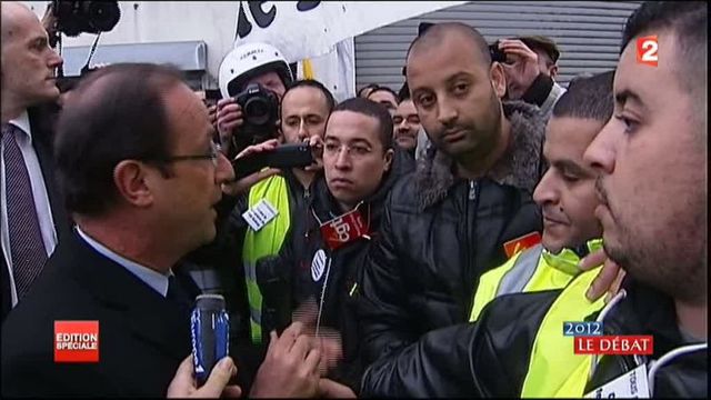 F. Hollande parle avec les manifestants de PSA