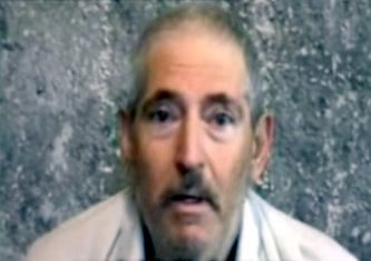 a screenshot of kidnapped Robert Levinson from a video sent to his family on December 9th 2011