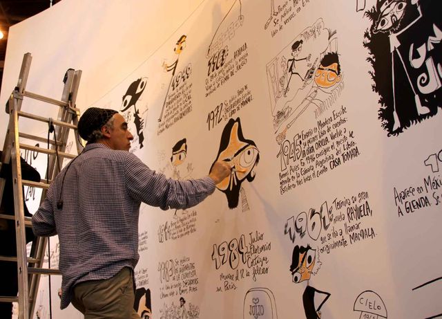 REP en train de peindre la fresque consacrée à Julio Cortazar au Salon du livre