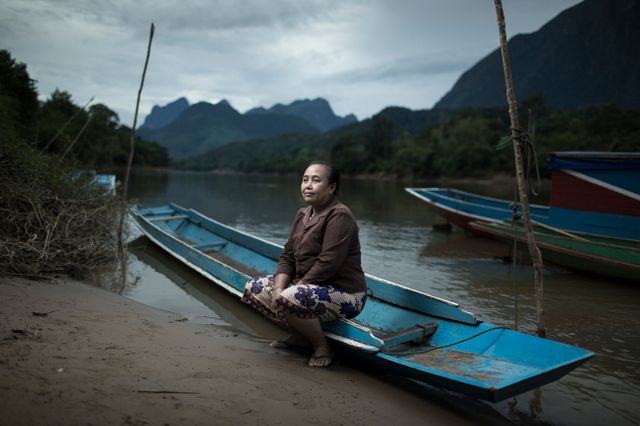 Madame Mii sur la rivière Nam Ou, au Laos