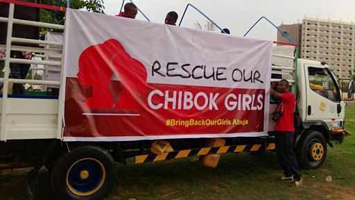 A truck promotes the hash tag used by protesters of the 2014 Chibok kidnapping