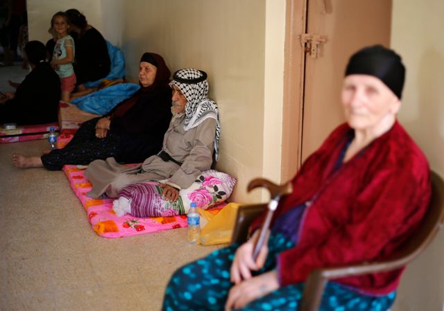 Famille de chrétiens irakiens qui a fui Mossoul pour se réfugier à Erbil