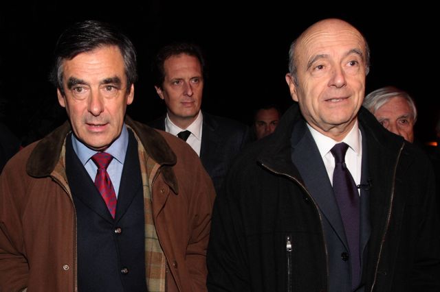 Alain Juppé et François Fillon lors d'un meeting en 2013