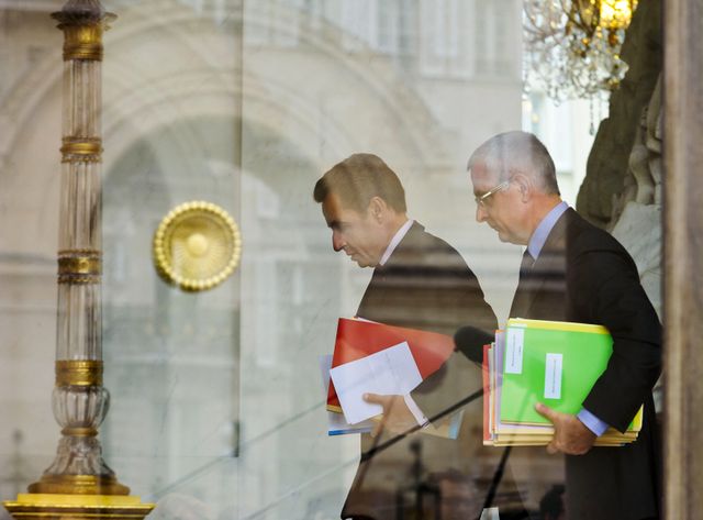 Xavier Musca, avec Nicolas Sarkozy, en 2011, à la sortie d'un conseil des ministres.
