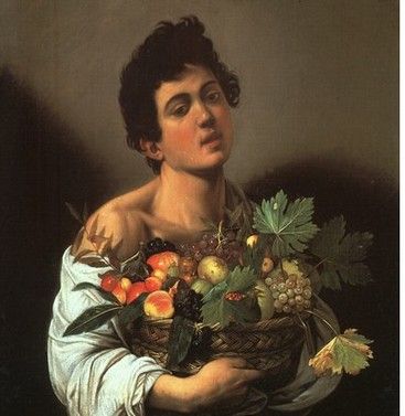 Jeune garçon avec une corbeille de fruits