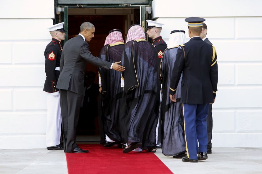 U.S. President Barack Obama ushers in the Saudi delegation, as he plays host to leaders and delegations from the Gulf Cooperatio