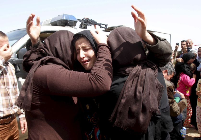 Membres de la minorité Yézidi relâchés par l'Etat islamique qui se retrouvent à Kirkouk, en Irak, le 8 avril 2015