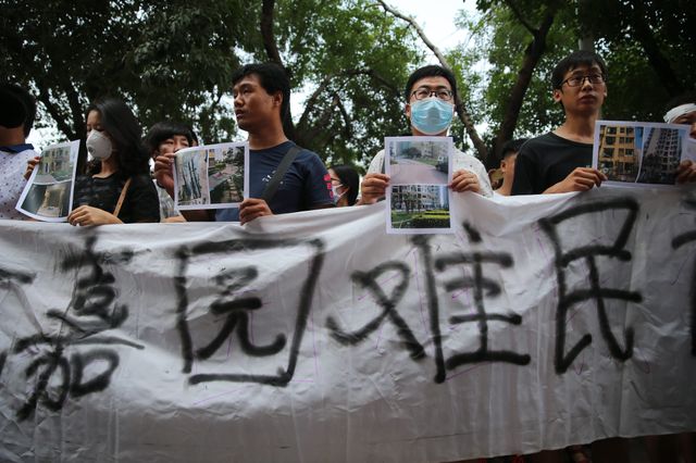 Des résidents de Tianjin dont les logements ont été détruits dans les explosions