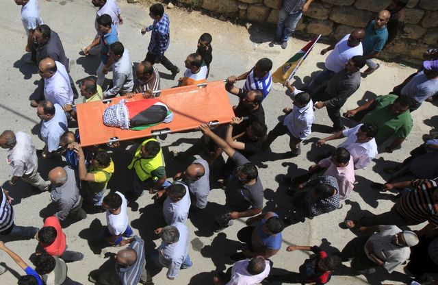 Funérailles d'un enfant palestinien de 18 mois tué dans un incendie criminel