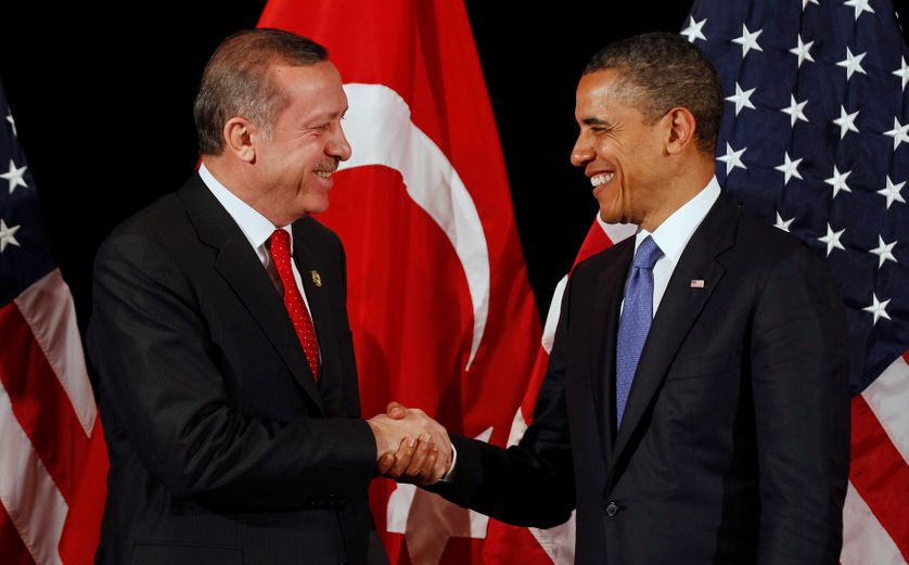 U.S. President Barack Obama (R) shakes hands with Turkey's Prime Minister Recep Tayyip Erdogan after a bilateral meeting