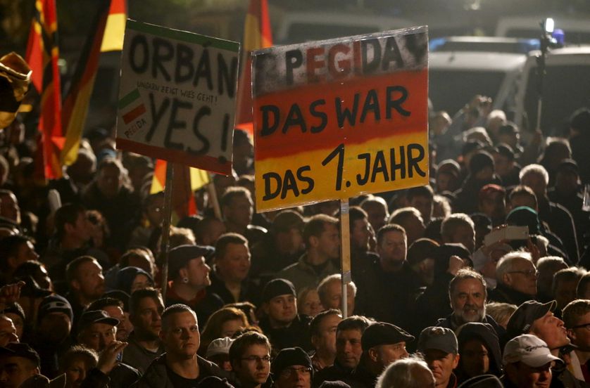 People gather for an anti-immigration demonstration organised by rightwing movement Patriotic Europeans Against the Islamisation