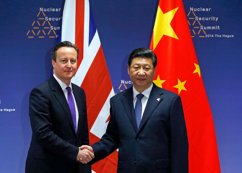 DATE IMPORTED: March 25, 2014 Britain's Prime Minister David Cameron (L) meets with China's President Xi Jinping during the Nucl