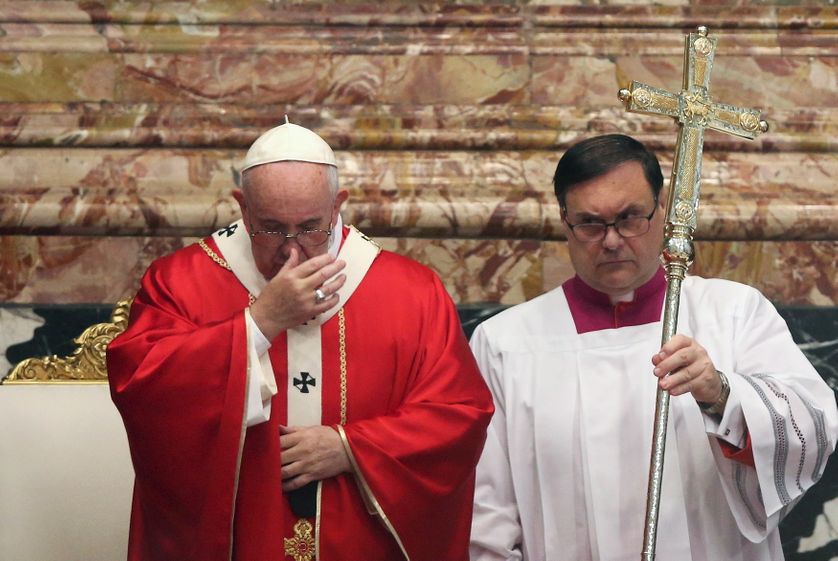 Pope Francis (L) in St. Peter's Basilica at the Vatican.