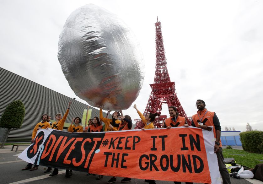 Partisans du désinvestissement en faveur du climat, le 2 décembre 2015, au Bourget, à la COP21