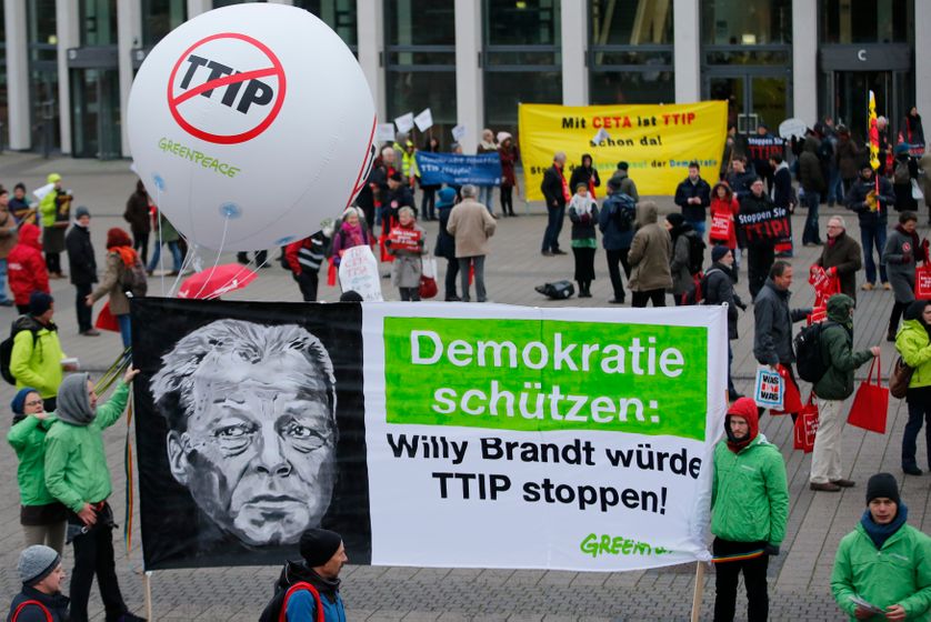 against TTIP outside the Social Democratic Party (SPD) congress in Berlin, Germany, December 11