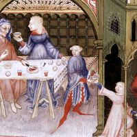 Moyen Age. Scène de repas. Albucacis. XIVe siècle. Conservation BN.