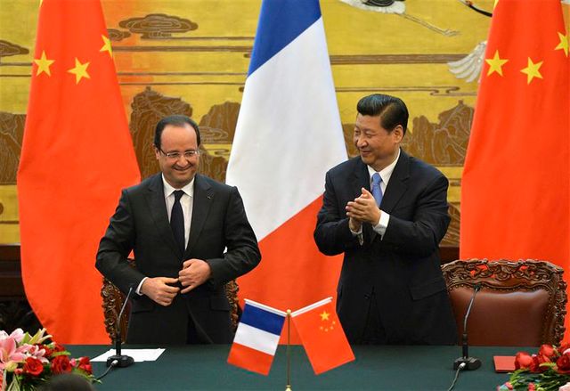 françois hollande prône un rééquilibrage des relations commerciales entre paris et pékin