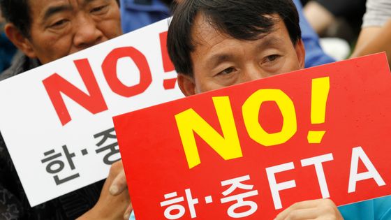 A Séoul, une manifestation contre le Free Trade Agreement (FTA) ©Reuters - Lee Jae Won