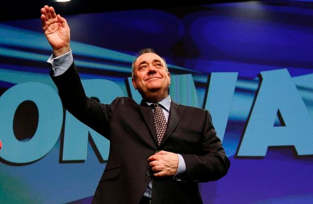 scotland's first minister salmond acknowledges applause following his speech at the snp spring conference in aberdeen