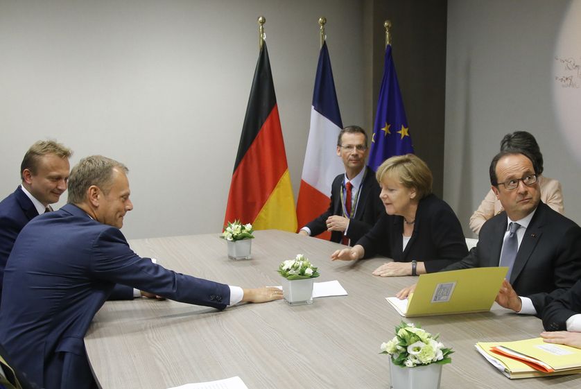 Donald Tusk, Angela Merkel et François Hollande lors d'une réunion d'urgence après le vote grec de rejet des mesures d'austérité proposées par l'Europe