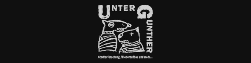 Le logo d'Untergunther : les deux chiens font référence à leur système anti-intrusion, qui consiste en des aboiements pré-enregistrés pour faire fuir quiconque s'approcherait de leur "planque".