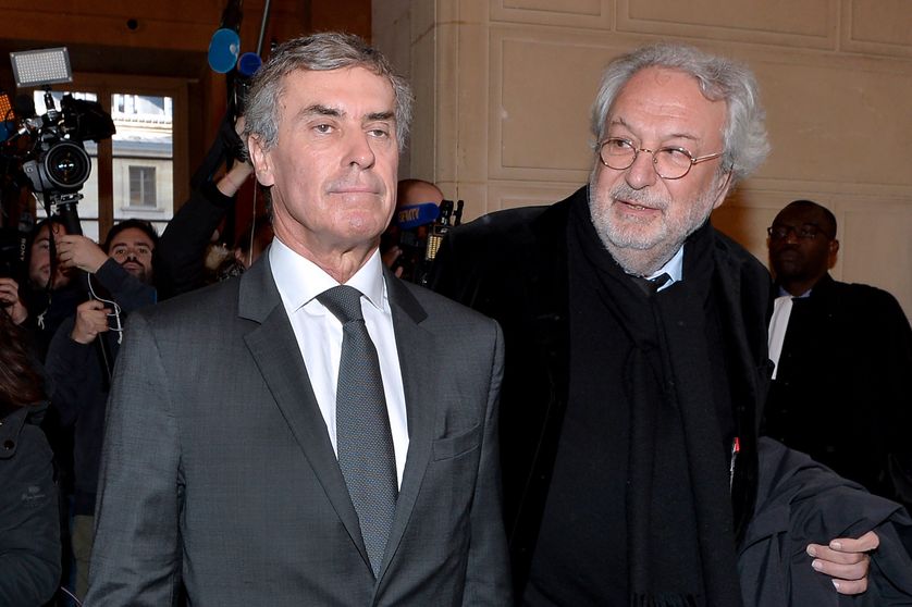Jérôme Cahuzac et l'un de ses avocats, Jean-Alain Michel, lors de l'ajournement de son procès en février 2016