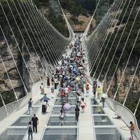 The world's highest and longest glass-bottomed bridge is seen above a valley in Zhangjiajie in China's Hunan Province on August 20, 2016.
