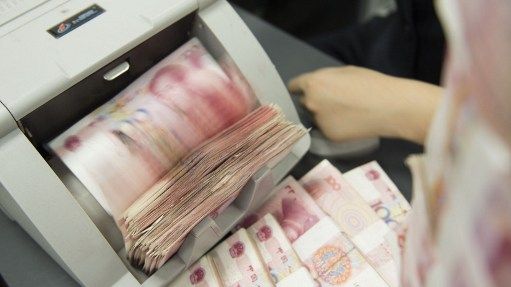 Des liasses de Yan, à Nantong dans la province de Jiangsu ©AFP - Xu jingbai / Imaginechina