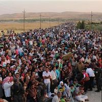 Silvia Borzelli et Geoffroy Jourdain et migrants syriens