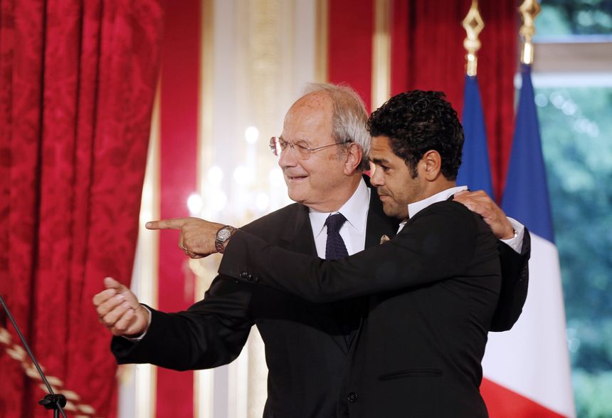 Marc Ladreit de la Charrière et Jamel Debouzze lors de la remise du prix de l’audace créatrice et culturelle en 2013 à l'Elysée