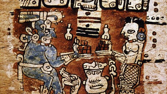 Représentation maya des deux dieux Chac et IxChel échangeant du cacao