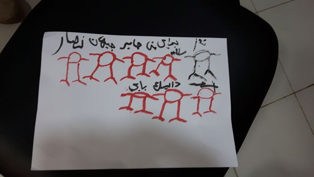 Dessin de Saher qui représente sa famille
