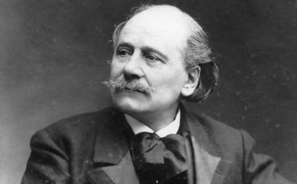 Photographie du compositeur Jules Massenet datant de 1900. Professeur de composition au conservatoire de Paris, il est particulièrement impliqué dans la formation et le développement personnel de ses élèves.