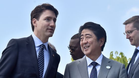 Justin Trudeau et Shinzo Abe, lors du dernier sommet du G7 à Taormine ©AFP - TIZIANA FABI