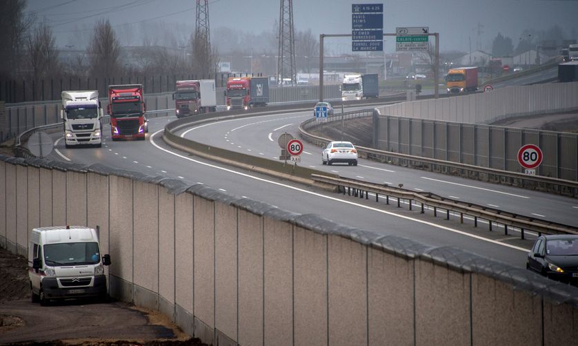 A photo taken on December 13, 2016 shows a four-metre-high (13-foot) wall, running along a kilometre-long stretch of the main road leading to Calais port, aimed at stopping migrants from the former Calais "jungle" camp who attempt to reach its shores