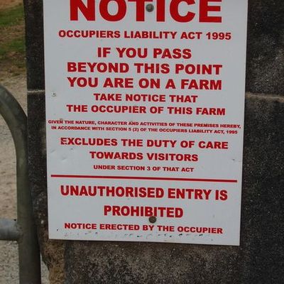 Notice excluding duty of care to farm visitors This notice is outside Rennard Pig Farm at Deeps, but it is a standard notice seen on many farms in Ireland.