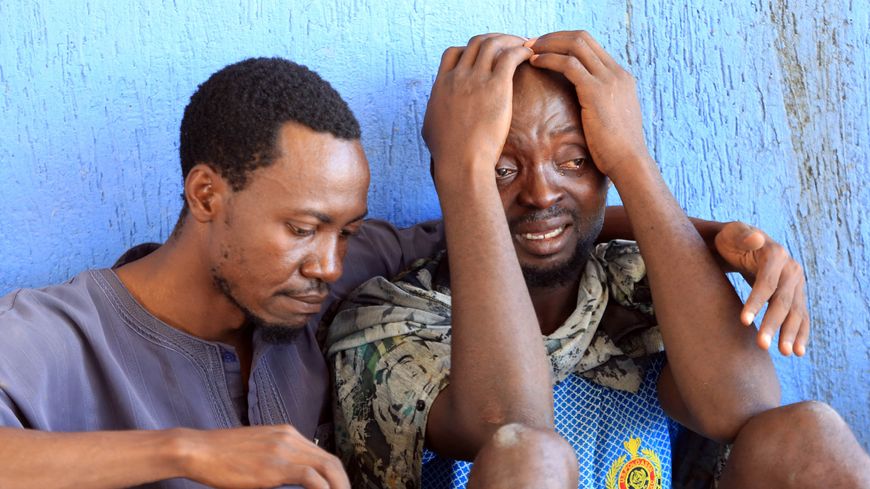 Des migrants dans un centre de détention à Guarabouli, à 60 kilomètres à l'est de Tripoli, en juillet 2017