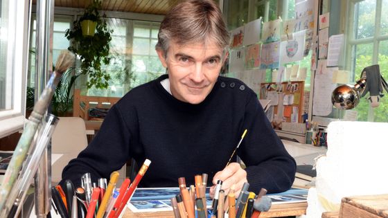 Emmanuel Lepage, dessinateur et auteur de bande-dessinée, dans son atelier. ©AFP - Damien Meyer