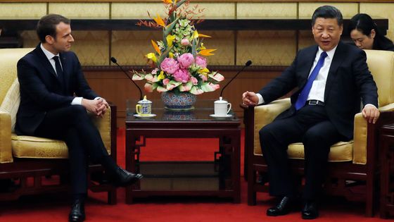 Emmanuel Macron reçu par son homologue chinois Xi Jinping à Pékin ©AFP - Andy Wong / POOL