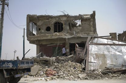 A Bagdad les Irakiens commencent à reconstruire les bâtiments détruits après 3 ans de combats contre l'État islamique A Bagdad les Irakiens commencent à reconstruire les bâtiments détruits après 3 ans de combats contre l'État islamique