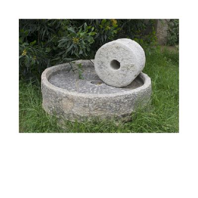 Moulin à petite meule horizontale, Volubilis, Maroc. Document présenté par Jean-Pierre Brun au Collège de France