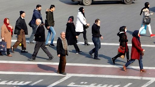 La loi en vigueur en Iran depuis la révolution islamique de 1979 impose aux femmes, Iraniennes ou étrangères, et quelle que soit leur religion ou croyance, de sortir tête voilée ©AFP - ATTA KENARE / AFP