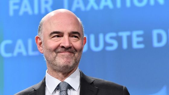 Pierre Moscovici, commissaire européen chargé des affaires économiques, financières et douanières, lors d'une conférence de presse. L'UE a dévoilé des propositions pour une taxe numérique ciblant aujourd'hui les géants américains de la technologie. ©AFP - Emmanuel Dunand