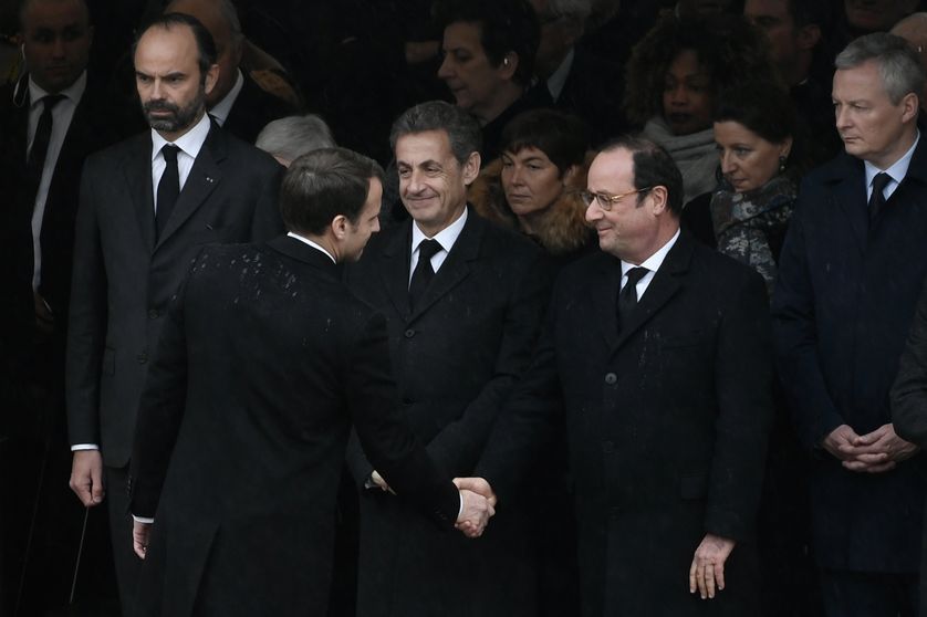 François Hollande et Emmanuel Macron à la cérémonie d'hommage national accordé au Lieutenant-Colonel Arnaud Beltrame le 28 mars 2018 à l'Hotel des Invalides