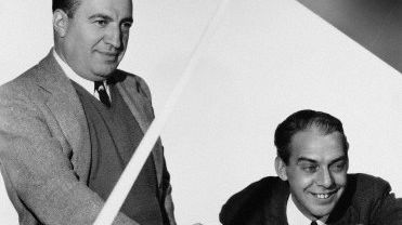 Gus Kahn (left) with composer Arthur Johnson in 1935 at MGM - MGM