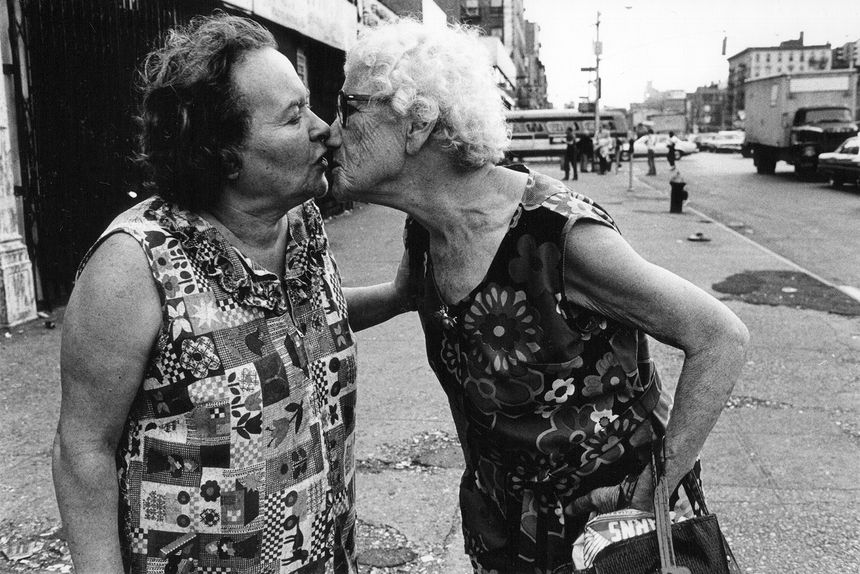 Arlene Gottfried - Sometimes overwhelming - Mommie kissing Bubbie on Delancey Street New York, 1979