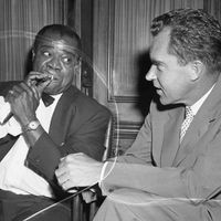Louis Amstrong en visite au Capitole en 1957, occupé par Richard Nixon © Coll. Bettman / Getty