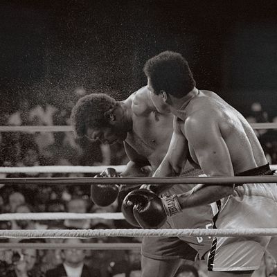 10/29/74-Kinshasa, Zaire: Muhammad Ali smashes a right to the head of George Foreman.