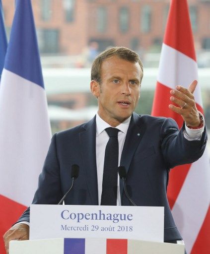 En visite à Copenhague, Emmanuel Macron a nuancé son éloge de la "flexisécurité" au Danemark