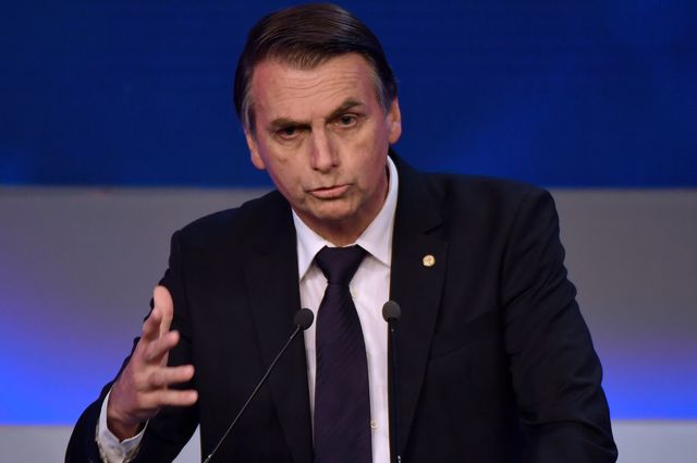 Jair Bolsonaro s'exprime, le 9 août, lors du premier débat télévisé organisé avant l'élection présidentielle brésilienne qui se tiendra les 7 et 28 octobre.